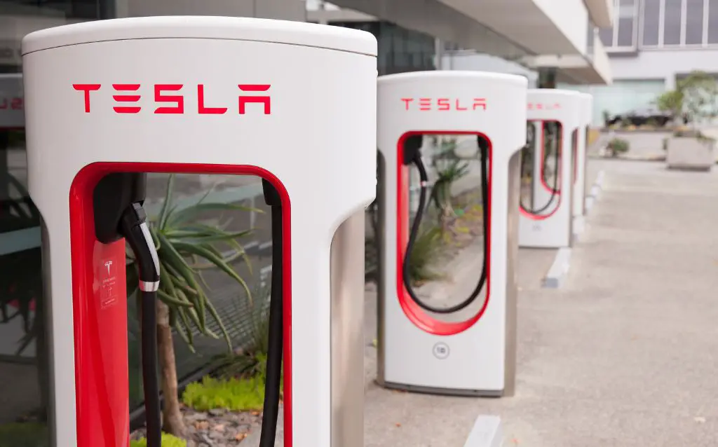A row of Tesla fast charging stations